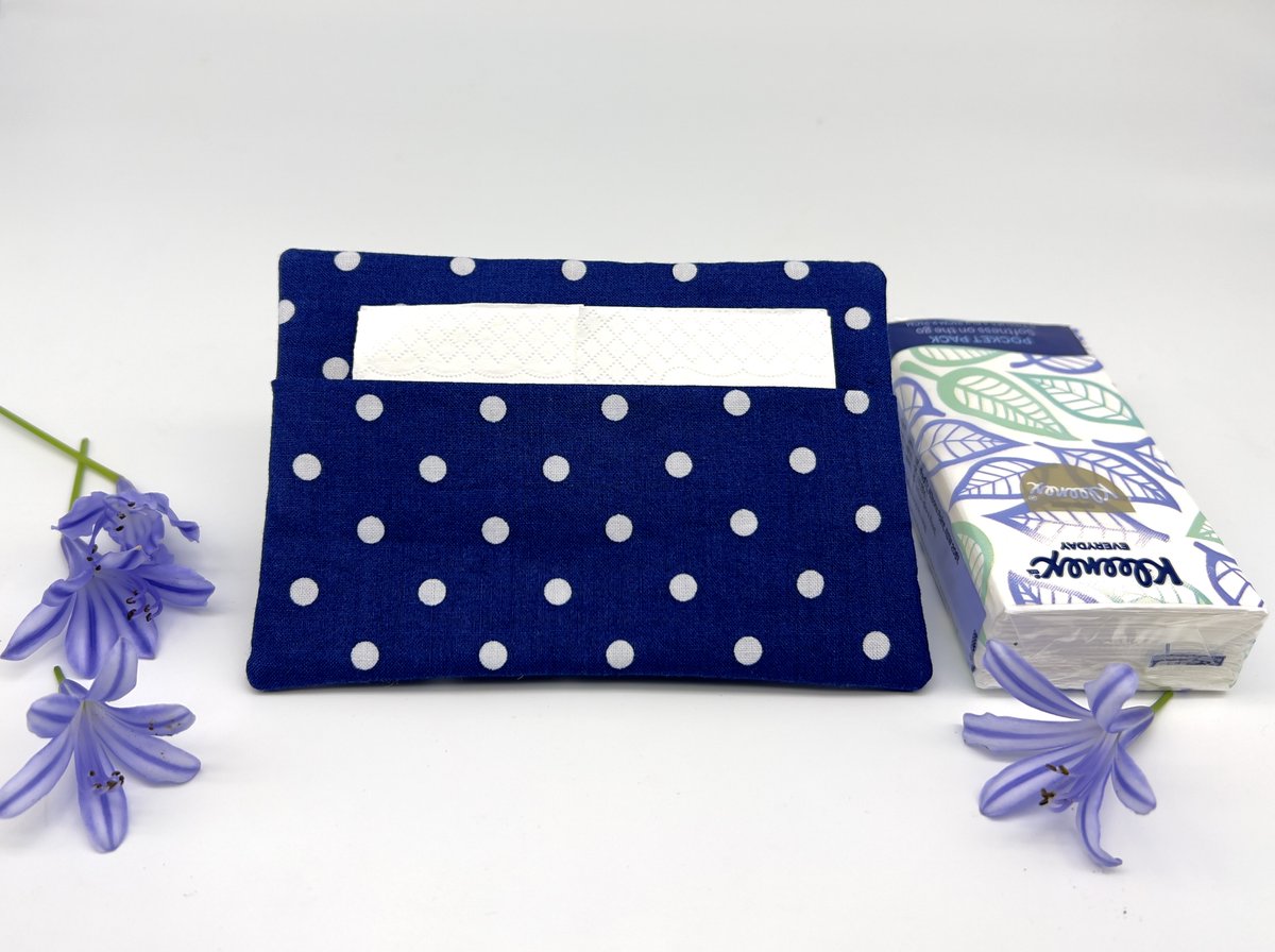 Add a pop of colour to your daily routine with this charming Indigo Blue and White Polka Dot Pocket Tissue Holder. Perfect for allergy seasons and the thoughtful design ensures quick and easy access when you need it. buff.ly/3YihxW8 #tissuepillow #tissueholder #allergy