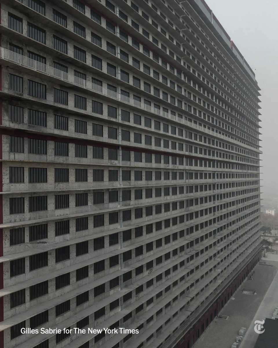 This high-rise tower in China isn't a housing block — it's a pig farm. Each floor operates like a self-contained farm for stages of a young pig’s life. Towers like this are part of China's push to reduce its dependence on agricultural imports. nyti.ms/3RK6cvB