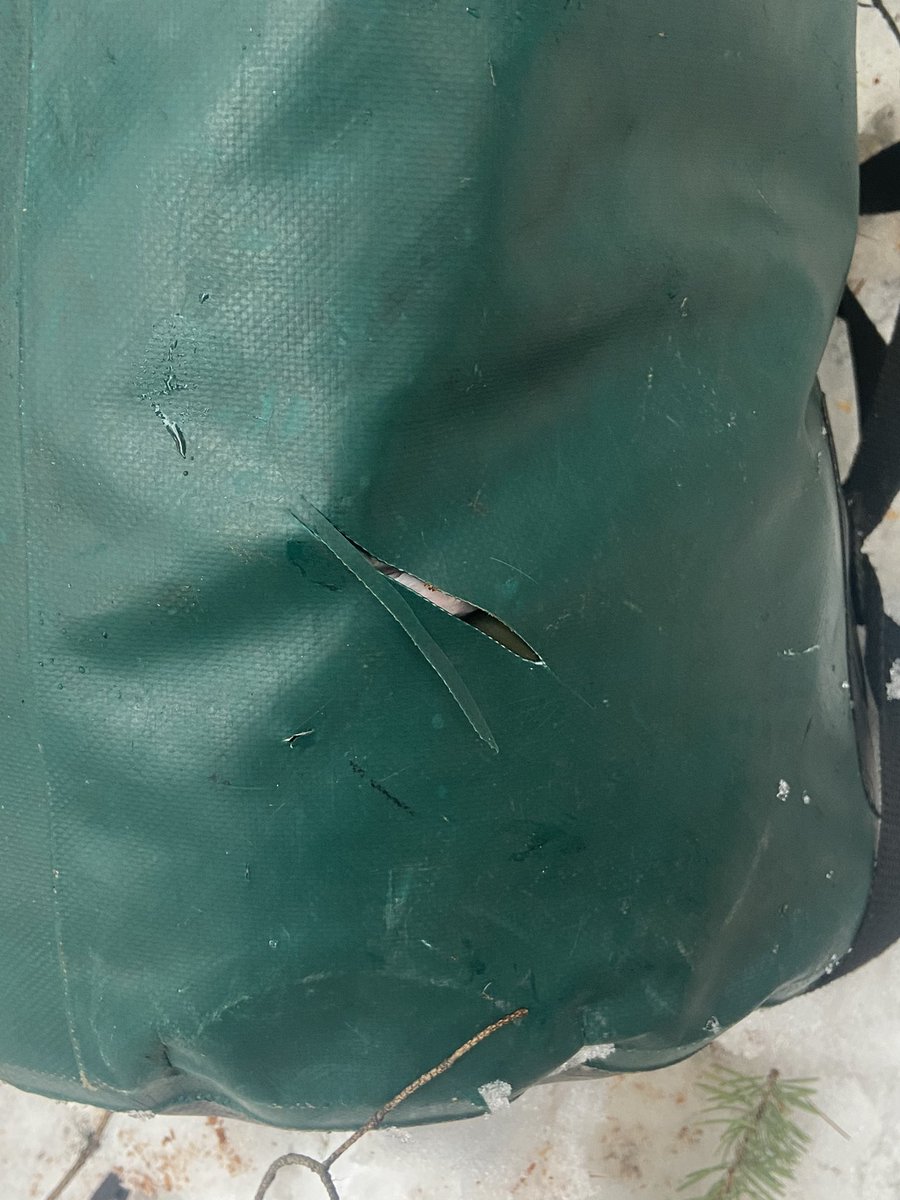Casualty of a sharp chain. My freshly sharpened chainsaw caught my sealline bag on my mountainous walk-in today. Have had this bag since late 90’s #dontmakethemliketheyusedto #firemitigation #kimberleybc #matthewcreek #spectrumresourcegroup #wildfireriskreduction #sealline #day68