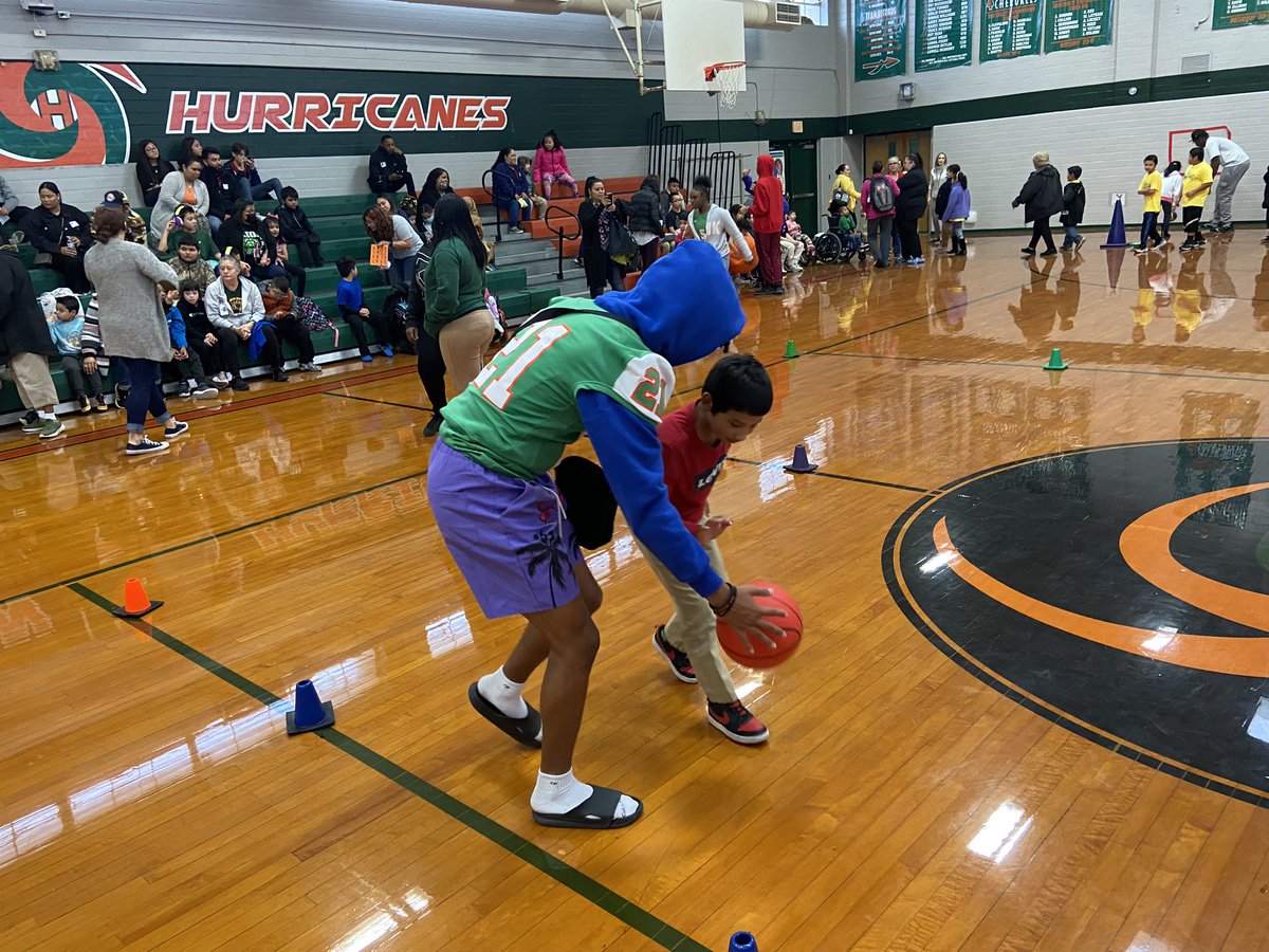 SAISDSamHouston's tweet photo. Mighty Hurricanes students had an amazing day with some amazing students! our Canes were honored to play basketball with SAISD elementary students for Special Olympics! Our Canes displayed their Hurricane power and LOVED every minute of it. #webelieve #hurricanepower 💚🧡💚🧡 https://t.co/gJpp6TSLgA