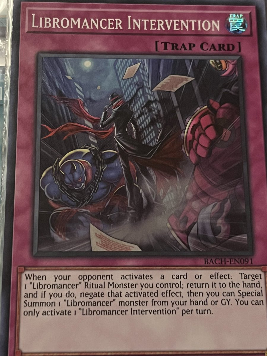 JDragon272's tweet photo. While looking through my cards… I think I found a clever Reference to Pulp Comics. This “Libromancer Intervention” Card, the guy here looks pretty close to “The Shadow”. Inspiration maybe? #yugioh #YuGiOhTCG #comics #comic #pulpcomic #TheShadow #darkhorse #reference #jdragon272 https://t.co/kBSuwwyZPB