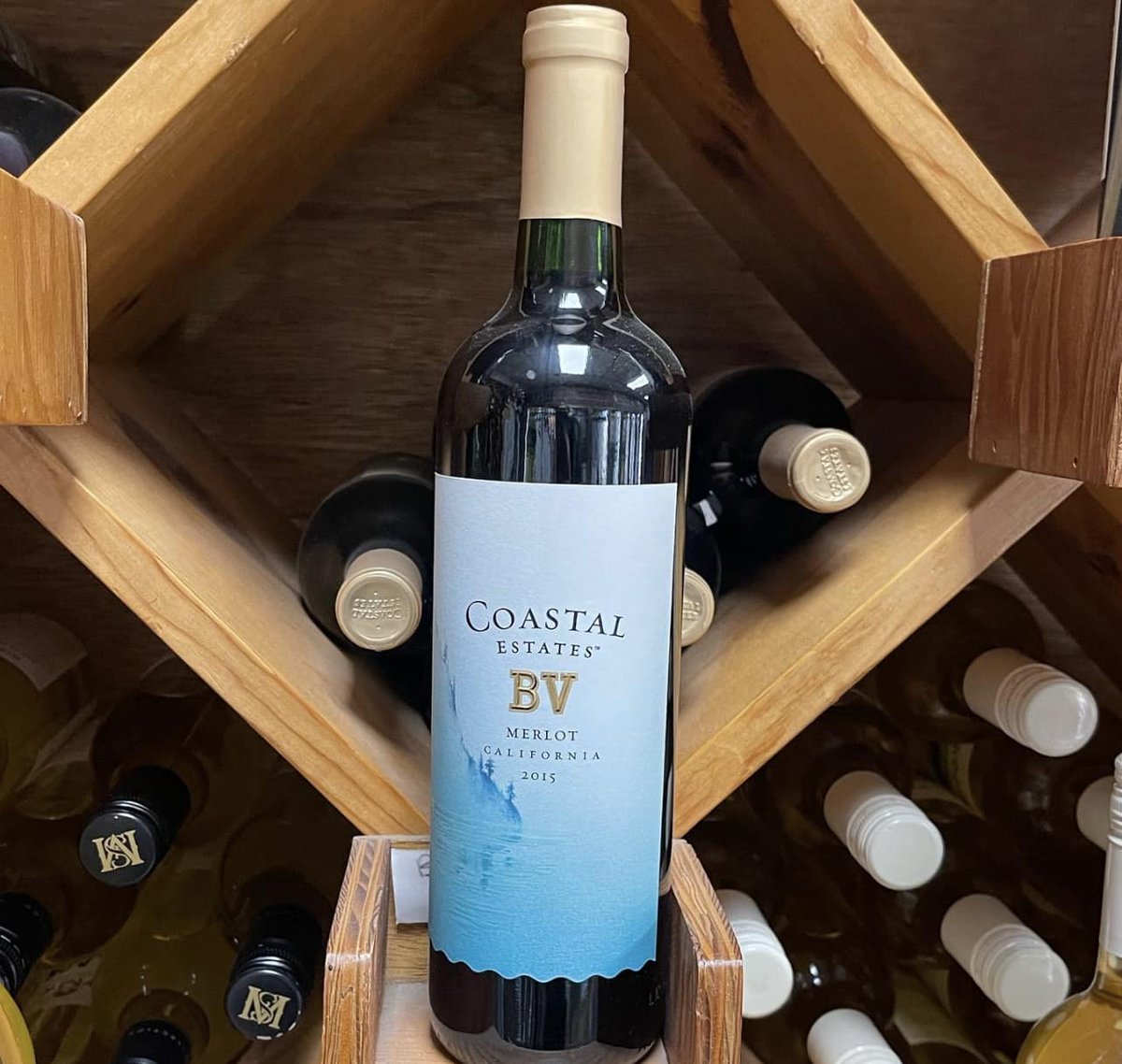 #WineWednesday: From the wine wall 🍷 Coastal Estates BV Merlot. 
Why we love this California Red: Fully ripe plumy aromas with hints of dark chocolate, subtle herbs and black cherry herald similarly intense fruit flavors.