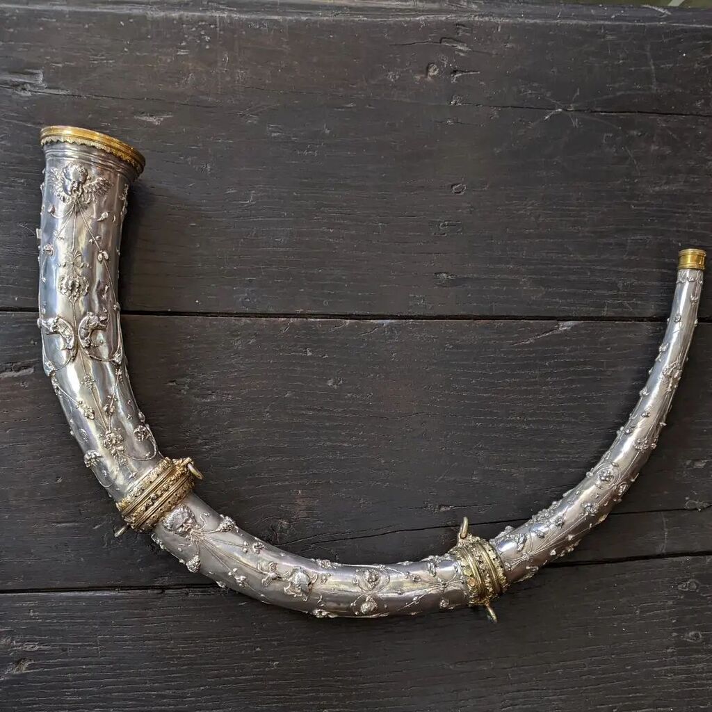 SportingCollect's tweet photo. This amazing silver hunting horn arrived yesterday. It's decorated with cherubs, unicorns, hounds &amp; many other things that I haven't identified yet https://t.co/lFruT7Kmmt https://t.co/vgjVyMXBoF