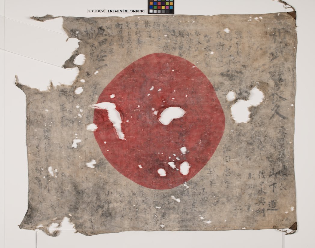 SeattleMilHist's tweet photo. Last week proved fascinating at the Washington National Guard Museum. It started when the relative of a World War II-era 161st Infantry officer forwarded this image of a yosegaki hinomaru from the family collection. #WWII #history @WANationalGuard https://t.co/LeCZZAvstW