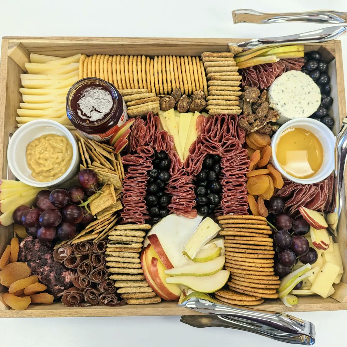 TheLetterM's tweet photo. Potluck lunch with #TeamTLM today! There was a lot of excitement over @sarahbeube's "M" charcuterie board, and it delivered. 😋 Plus mouth-watering shepherd's pie, soup, meatballs, desserts... https://t.co/pp232fVzkH