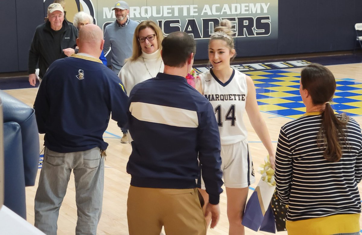 Tonight I'm here at Bader Gym in Ottawa to see the Marquette Crusaders take on the St. Bede Bruins in a non-conference girls basketball contest. The Cru honored their lone senior, Eva McCallum, and her family prior to the game.