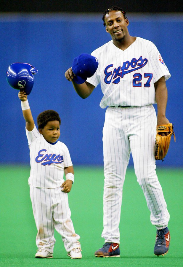 baseballinpix's tweet photo. Vladimir Guerrero Sr. and Jr. together, 2003. Will they go down as the greatest Father-Son combo of all time? https://t.co/svLnusQeKS
