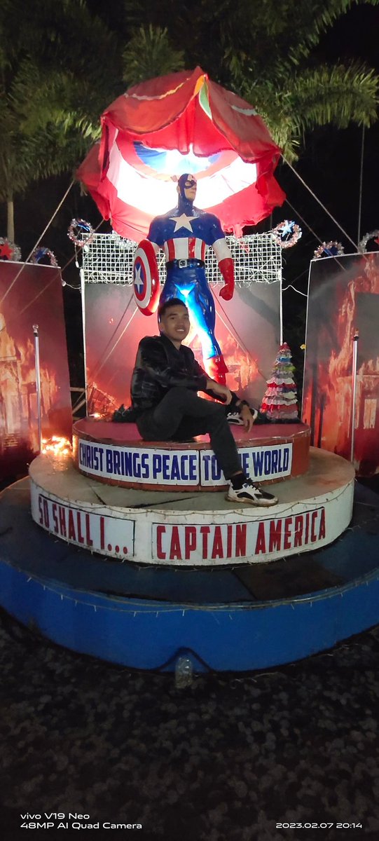 Taking a picture with Captain america but he looks so serious.Hahahaha