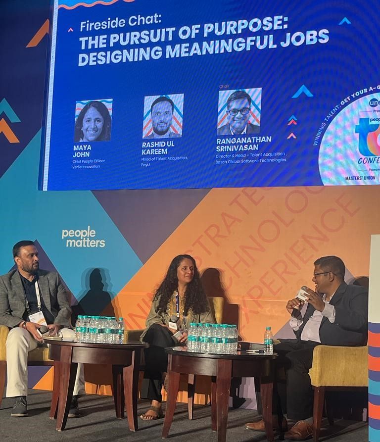 PeopleMatters2's tweet photo. We have all heard about the ‘pursuit of happiness’ but what about the 'pursuit of purpose'? In a fireside chat on 'Designing Meaningful #Jobs', Ranganathan Srinivasan, @ayamjohn and Rashid ul Kareem spoke about how TA leaders are at the heart of providing jobs.

#PMTAC https://t.co/SRL4iCeDS9