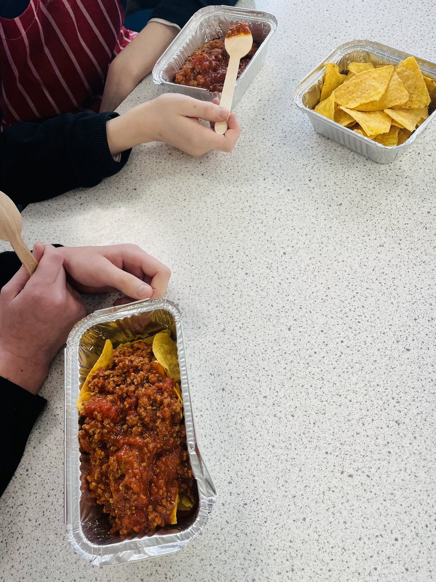 Two of our S1 Multistudy students using the hob for the first time to make some chilli nachos! They’ve been exploring  new tastes and techniques in their skills sessions with Mrs Brown and Miss Grant 🌶 🌟 #chefsofthefuture #tryingnewthings