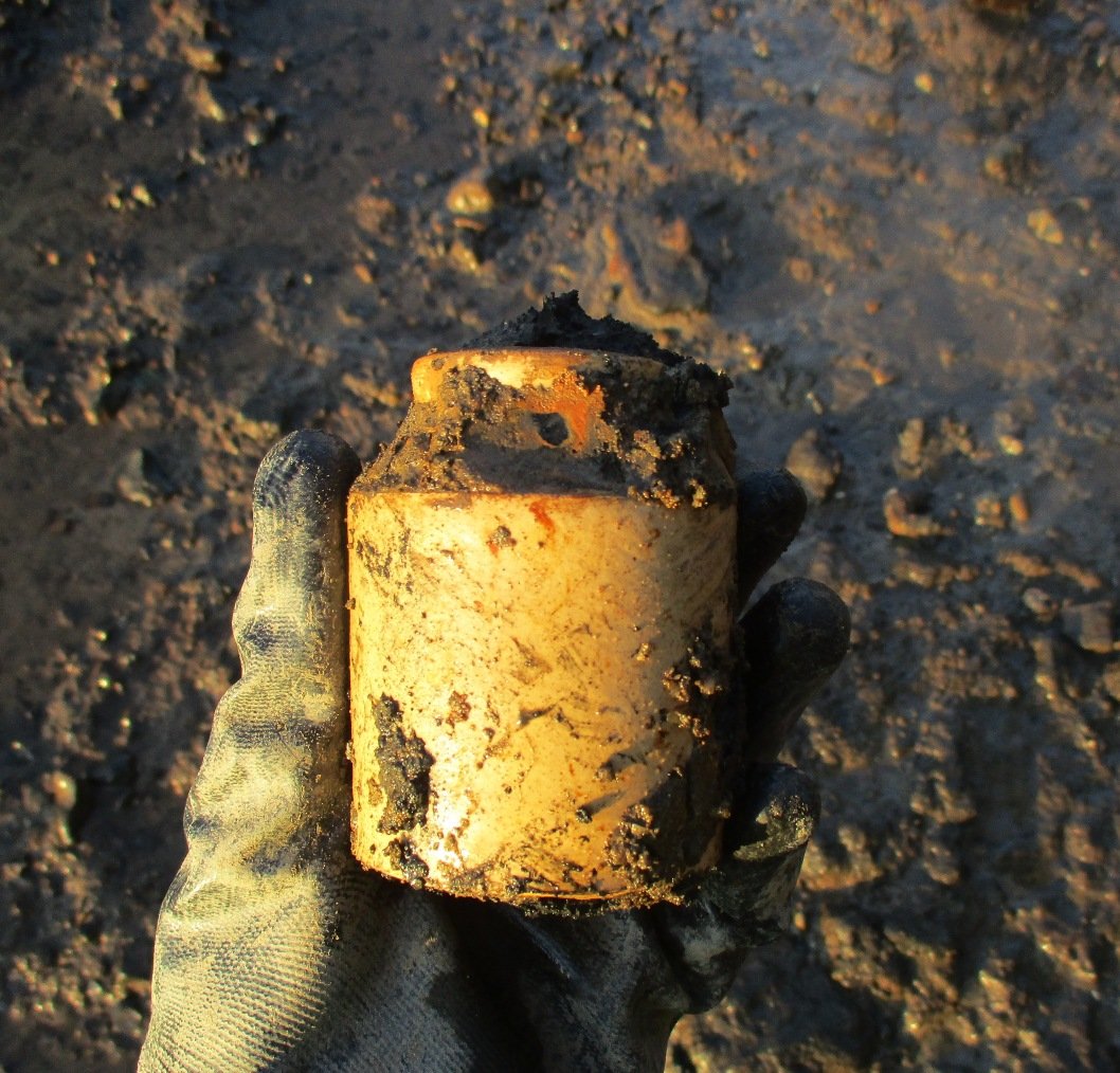 GermanderS's tweet image. A perfect stoneware pot - first spotted as a patch of ceramic in the mud, which to my pleasure, came out complete! Not sure what this size pot is for; it's like a double-height inkwell or a half-length bottle....