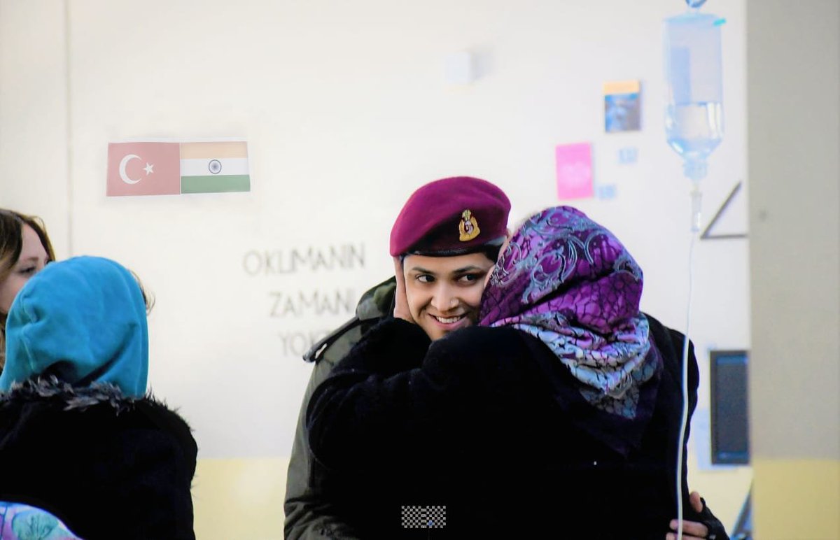 A Turkish woman hugs a woman officer of the Indian Army and gives her a peck, in an earthquake-affected area of Turkey. Indian Army has deployed disaster relief teams and Army Field Hospital to help the victims of the earthquake. #TurkeyEarthquake