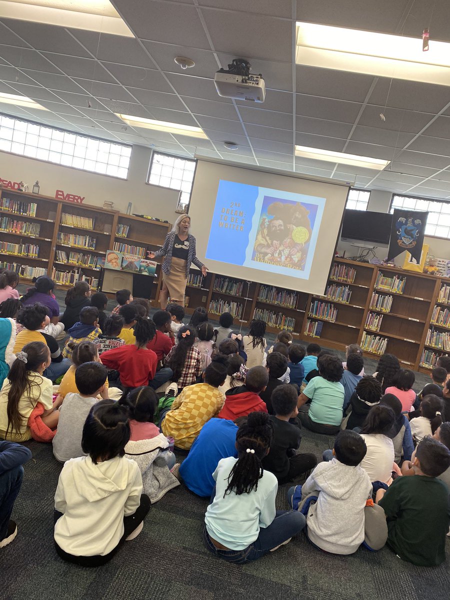 NWES_Library's tweet image. We LOVE having @bridgetheos here at our school today!!! Our kindergartners and first graders are LOVING hearing what it’s like to be an author!!! #pfisdreads #authorvisitsrock