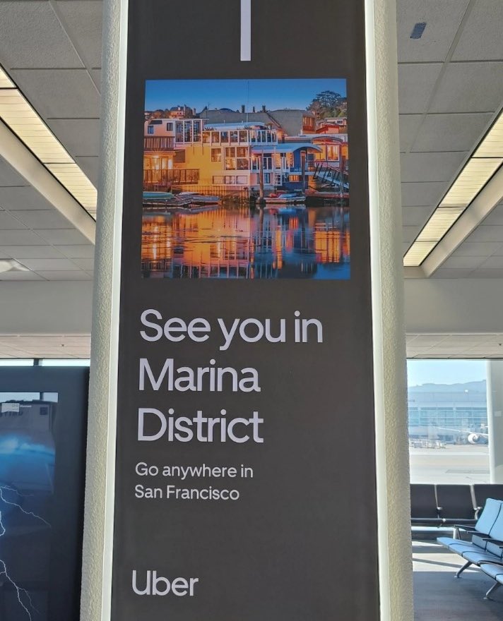 Uber ads at SFO seemingly written by people who have never been to San Francisco… no one here talks like this. 
Would be “at the Embarcadero”
“In the Mission”
“in the Marina” which btw doesn’t look like that - it’s a picture of Sausalito!

Who do we think designed these ads???