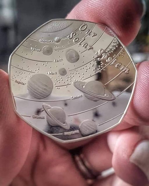 Who else wants this coin with the solar system. 😲😍🌌💜