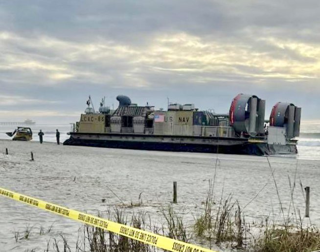 EdPiotrowski's tweet photo. Last Saturday a Chinese Spy balloon in Myrtle Beach. Today a U.S. Navy Landing Craft Air Cushion (LCAC) is sitting on Cherry Grove Beach. Trying to figure how it got there. 📸 D Angela Williams. https://t.co/BrS2pTfNZO