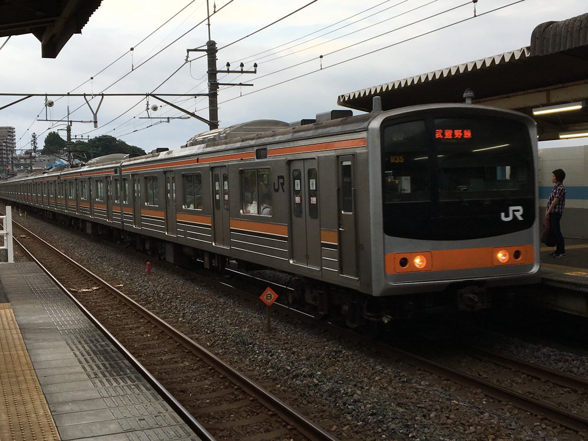 train station train railroad tracks ground vehicle scenery outdoors real world location  illustration images