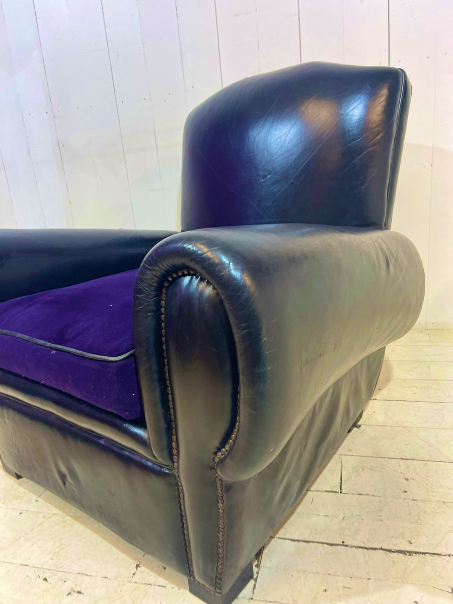 eclectic_trade's tweet photo. Chair of the day. 1920’s moustache club chair in distressed black leather, velvet feather cushion. Available on our website. The Rare Chair Company. #artdeco #moustachechair #blackleather #feathercushion #purplevelvet #interiordesigner #supportsmallbusiness https://t.co/YCYzwNqD4D