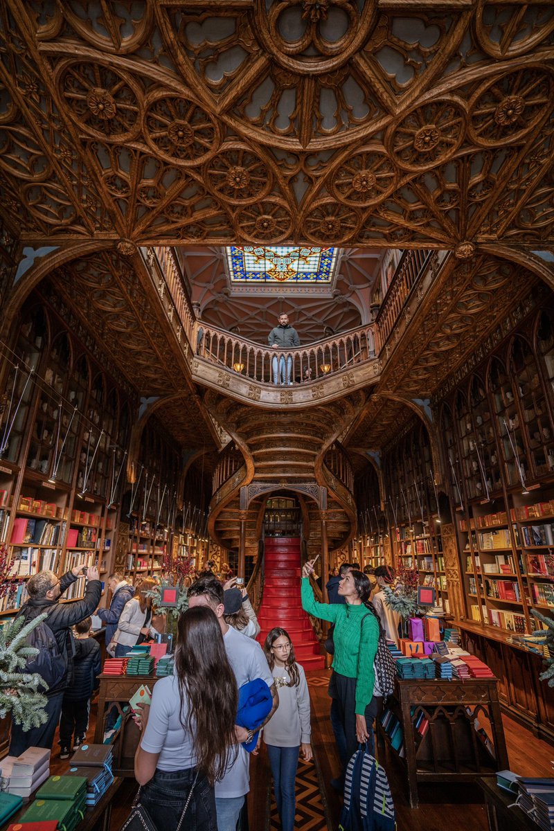 With intricately carved gothic wood-paneling, a grand curving staircase, floor-to-ceiling bookshelves, and stained-glass skylight, Livraria Lello is one of the best attractions in #Porto #Portugal @visitporto @CentroPortugal @visitportugal