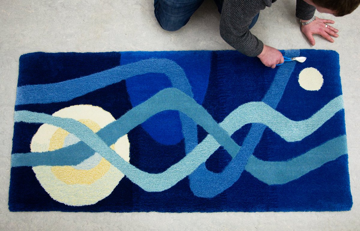 A final quality control check by Andrew.

'Moons and wave' rug.

#orkney #visitorkney #madeinorkney #handcrafted  #rug #wool #shetlandwool #rugs #tufting #rugtufting