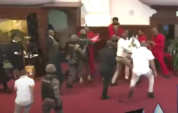 News24's tweet photo. #SONA2023 LIVE | Chaos in Parliament as EFF MPs storm onto Ramaphosa’s stage

https://t.co/qNIj5s4U66 https://t.co/1lPq7hEsVa