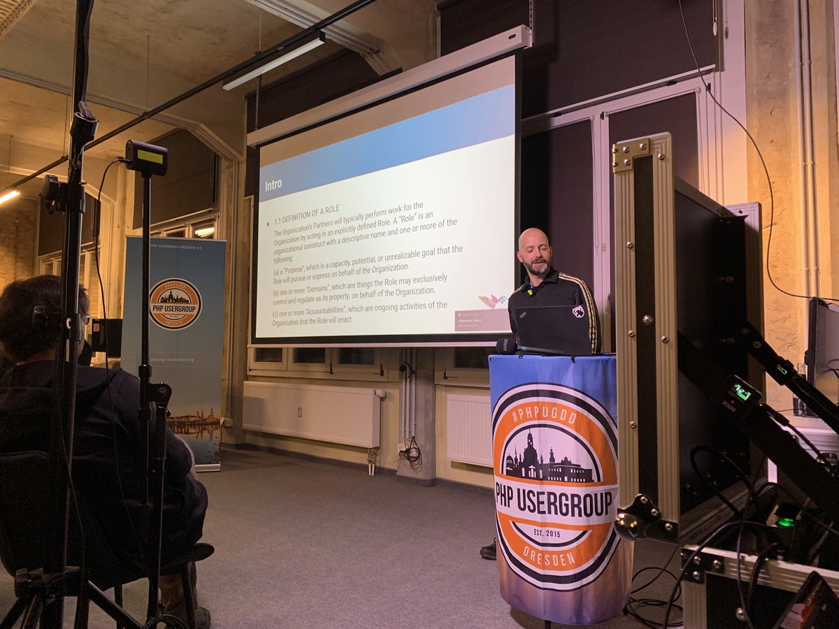 phpugdd's tweet photo. Host intro by #ostec‘s agile coach Zinn, opening todays #PHPUGDD #meetup where we‘ll talking about „Initiating change: An approach for developers.“ with Patrick Heller from @Digistore24. Tune in on #YouTube 👉 https://t.co/lEeNpPYLhX
#PHP #Dresden #Community https://t.co/4LQPfGw4Qh