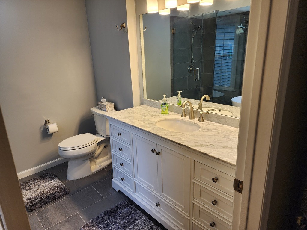 M&amp;M Construction Specialist just finished a #bathroomremodel in #Randolph, #NewJersey. We transformed this #bathroom which had a whirlpool tub and shower into a bathroom that has a shower and freestanding #soakingtub. We removed the wall between the toil… instagr.am/p/Coc-IWtvrMd/