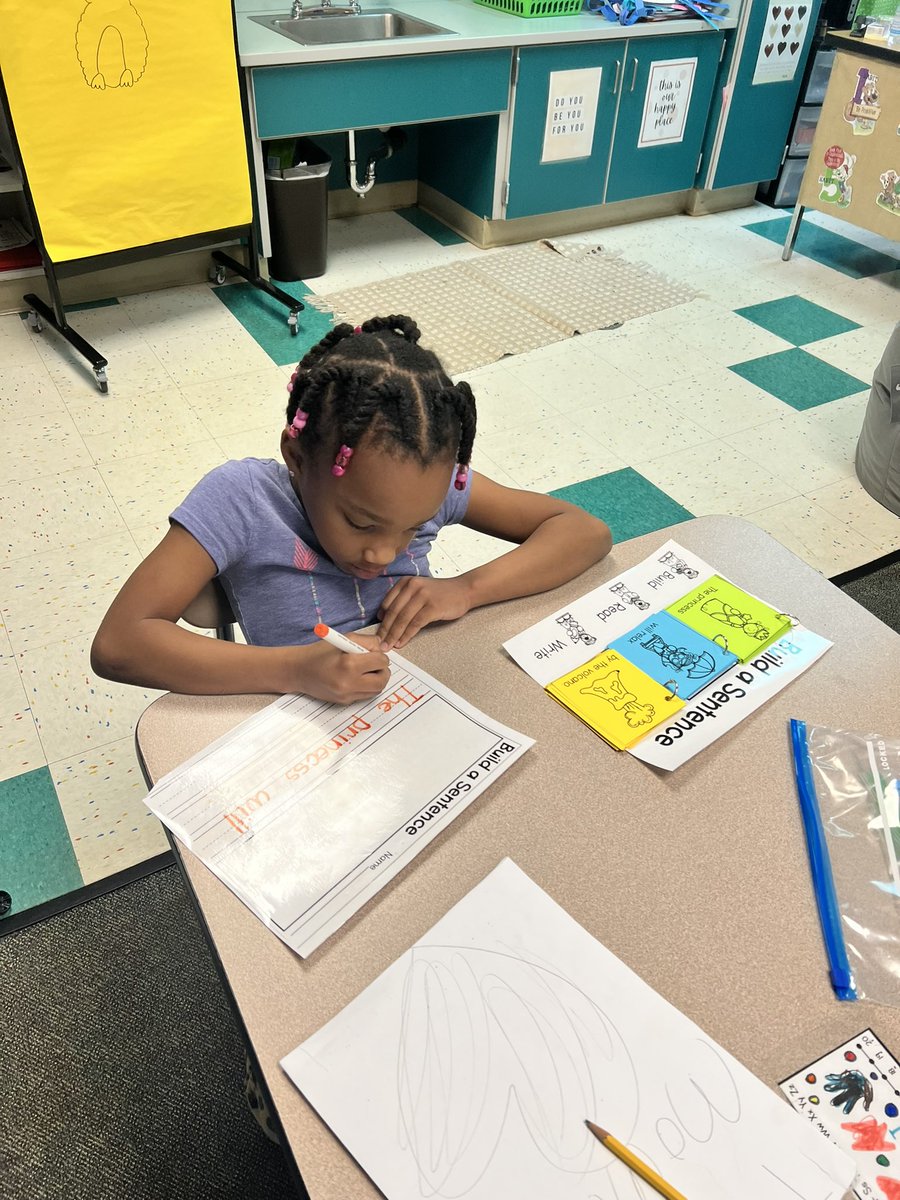 Students working hard during centers to create some silly sentences!