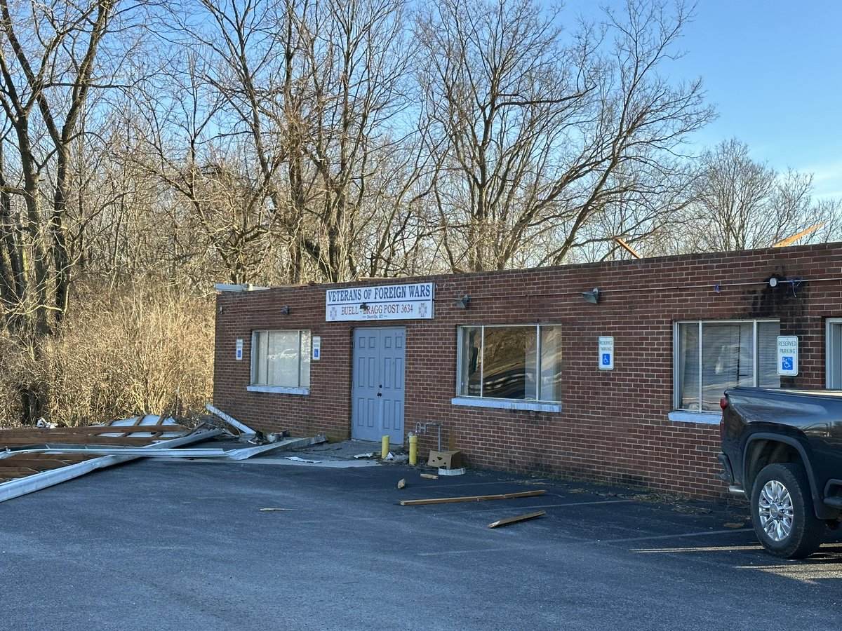 Pflug's tweet photo. Highwind damage to the local VFW the Highwinds blew the roof off into the front parking lot @ryanhallyall https://t.co/EgwGnNAbmi