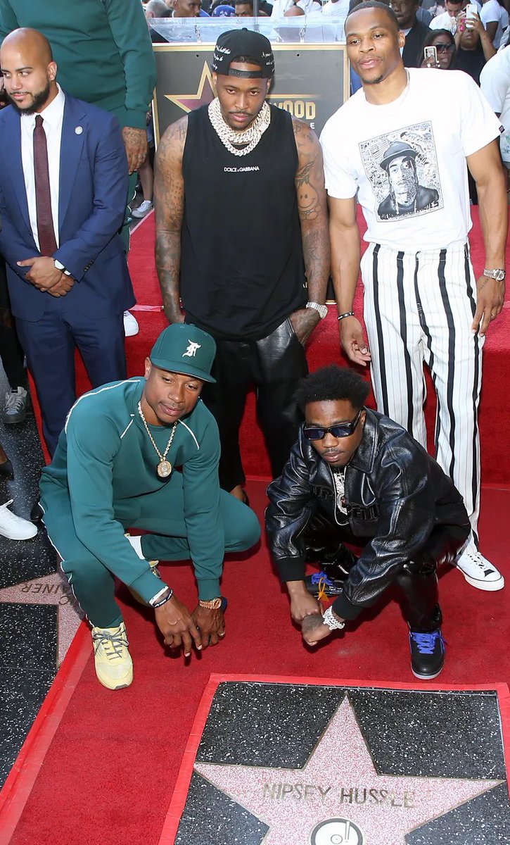 When we honored Nip posthumously with a star on the walk of fame, Russ pulled up.