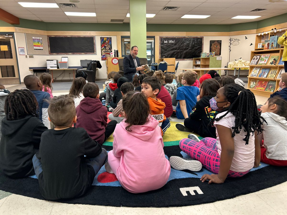 esmp_RETSD's tweet photo. A big thank you to MLA Matt Wiebe for being a guest reader at ESMP on Tuesday! Mr. Wiebe gifted our Library Learning Commons with two new books, and our grade 1/2/3 students were so happy to have Mr. Wiebe share a story with them! @RETSDschools @mattwiebeMB https://t.co/vIZVhdx6p5