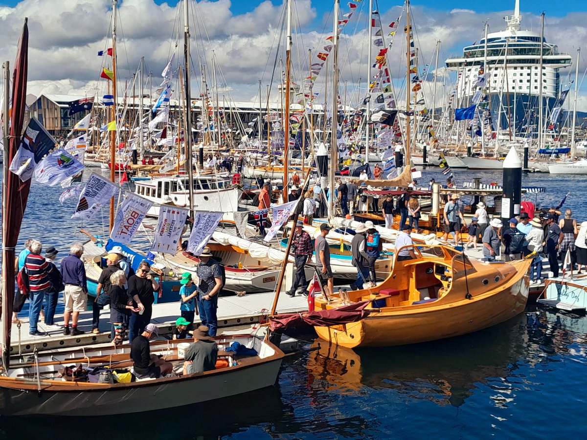 eventstasmania's tweet photo. The sun came out for a spectacular first day of the @AusWoodenBoat festival. #Hobart's iconic waterfront is buzzing with activity &amp; will be all weekend.  #hobartevents #Tasmania #Tasevents #boats #eventstasmania #woodenboats https://t.co/L11pyV1qv9