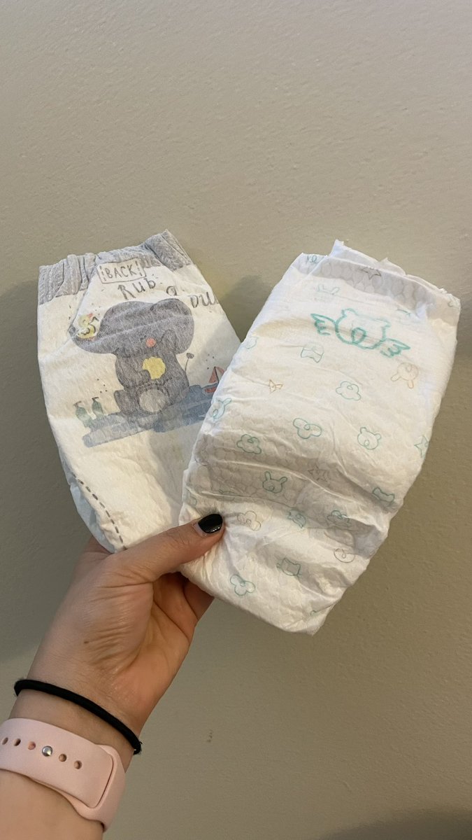CarbZombie's tweet photo. @Pampers Thanks! DMing now. For whatever reason, I now have cause to believe someone swapped in non-Pampers diapers in the box…. On the right are the diapers that weren’t in bags with codes 😧 https://t.co/2Ax9GAnHKz