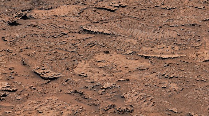 Ripples in rock showing wave action in a lake When NASA’s Curiosity rover arrived at the “sulfate-bearing unit” last fall, scientists thought they’d seen the last evidence that lakes once covered this region of Mars. That’s because the rock layers here formed in drier settings than regions explored earlier in the mission. The area’s sulfates – salty minerals – are thought to have been left behind when water was drying to a trickle. So Curiosity’s team was surprised to discover the mission’s clearest evidence yet of ancient water ripples that formed within lakes. Billions of years ago, waves on the surface of a shallow lake stirred up sediment at the lake bottom, over time creating rippled textures left in rock. NASA’s Curiosity rover recently found surprising clues to Mars’ watery past, including while exploring a region called the “Marker Band.” Credits: NASA/JPL-Caltech/MSSS “This is the best evidence of water and waves that we’ve seen in the entire mission,” said Ashwin Vasavada