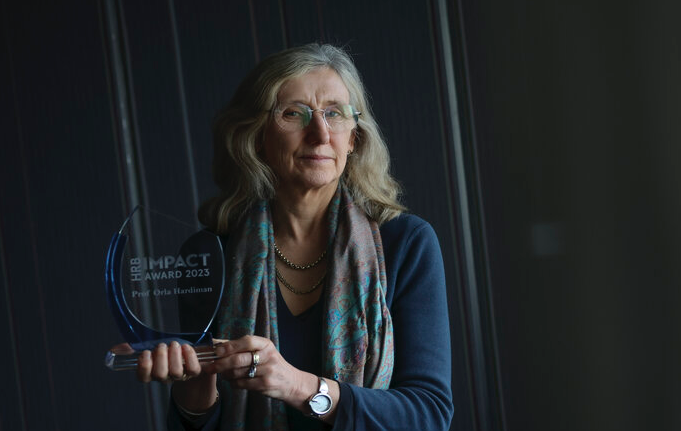 Professor Orla Hardiman from the School of Medicine, Discipline of Neurology, stands with her HRB Impact Award 2023 at the official award ceremony yesterday evening, February 9th 2023.