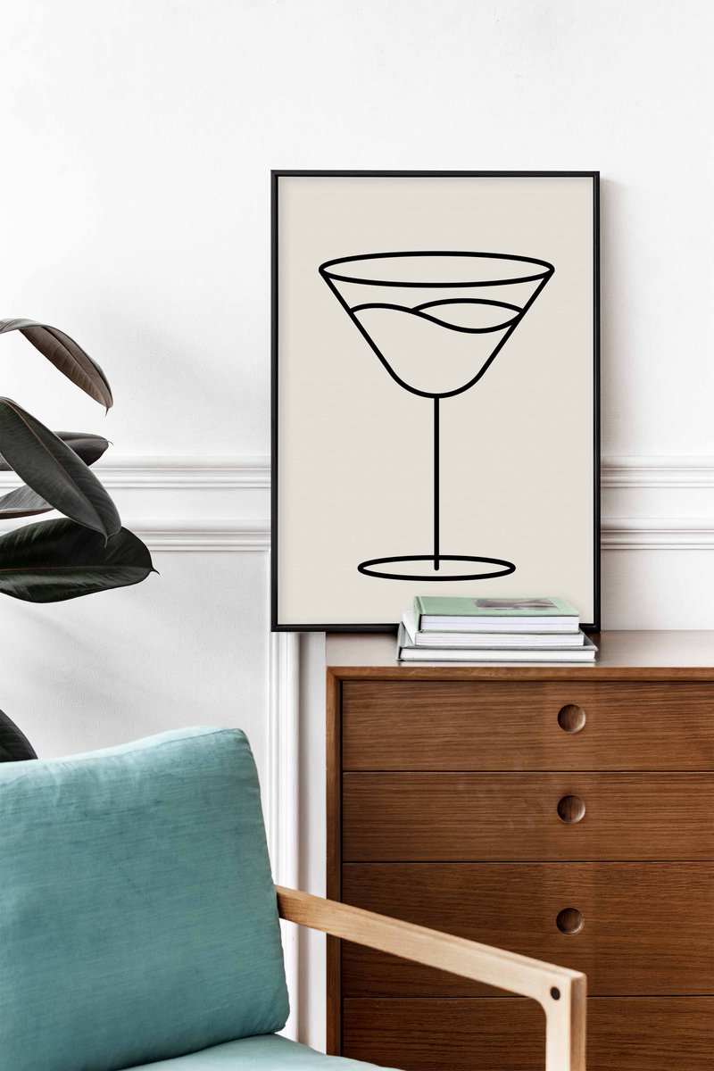 Grab a martini after purchasing this martini one line art for your space.  Click the link in our bio! #linkinbio #blackandwhite #onelinedrawing #cheapgiftforher #alcoholdrink #martiniglassprint #alcoholicbeverage #minimalistart #lineart #olivegarnish #classicvodkadrink #vermouth