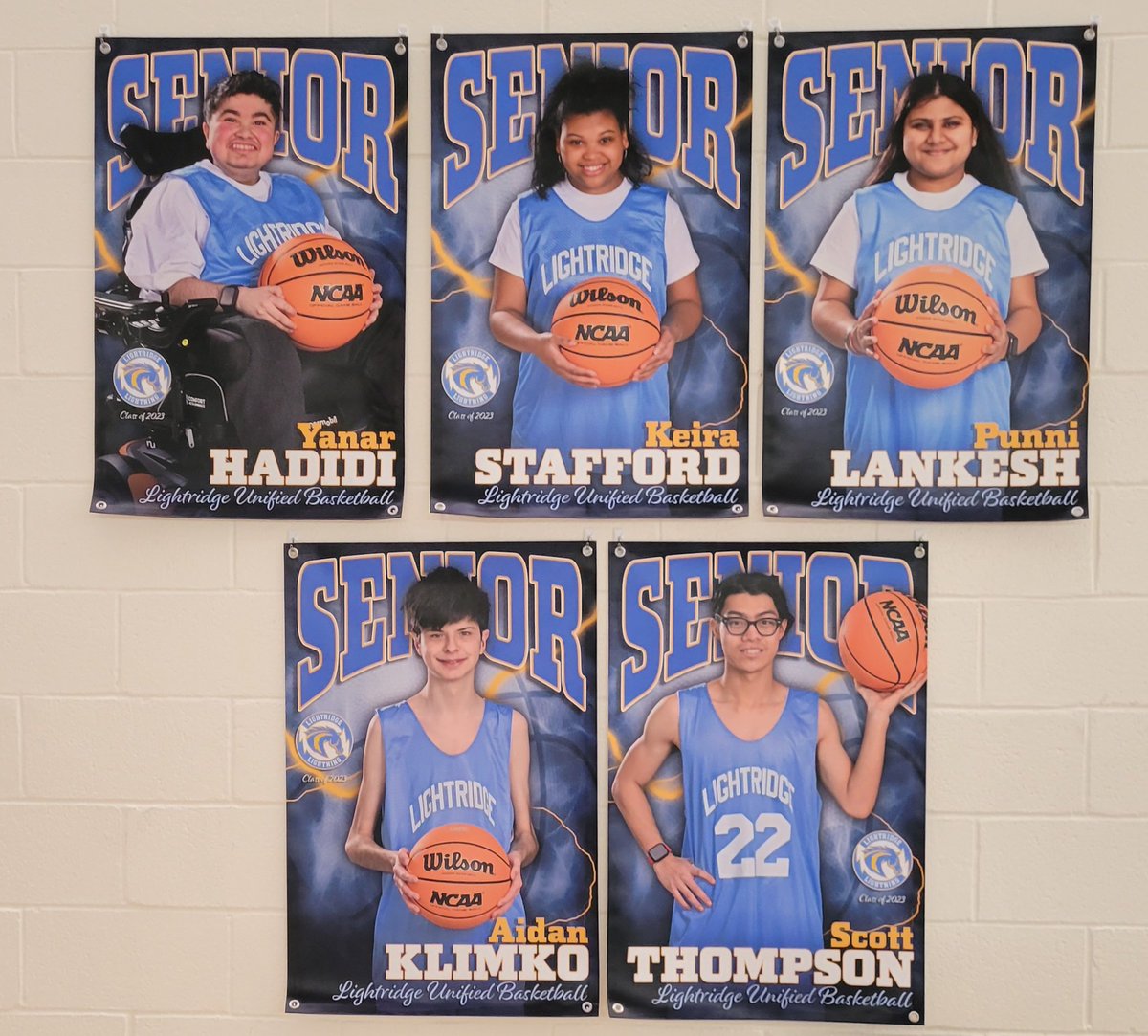 ItsMrsNewbold's tweet photo. I love the new posters displayed in the main gym of our rockstar Unified Basketball seniors @Lightridge_LCPS! I'm looking forward to the game on Saturday 🏀⚡️😎!! https://t.co/37aBCcxoDO