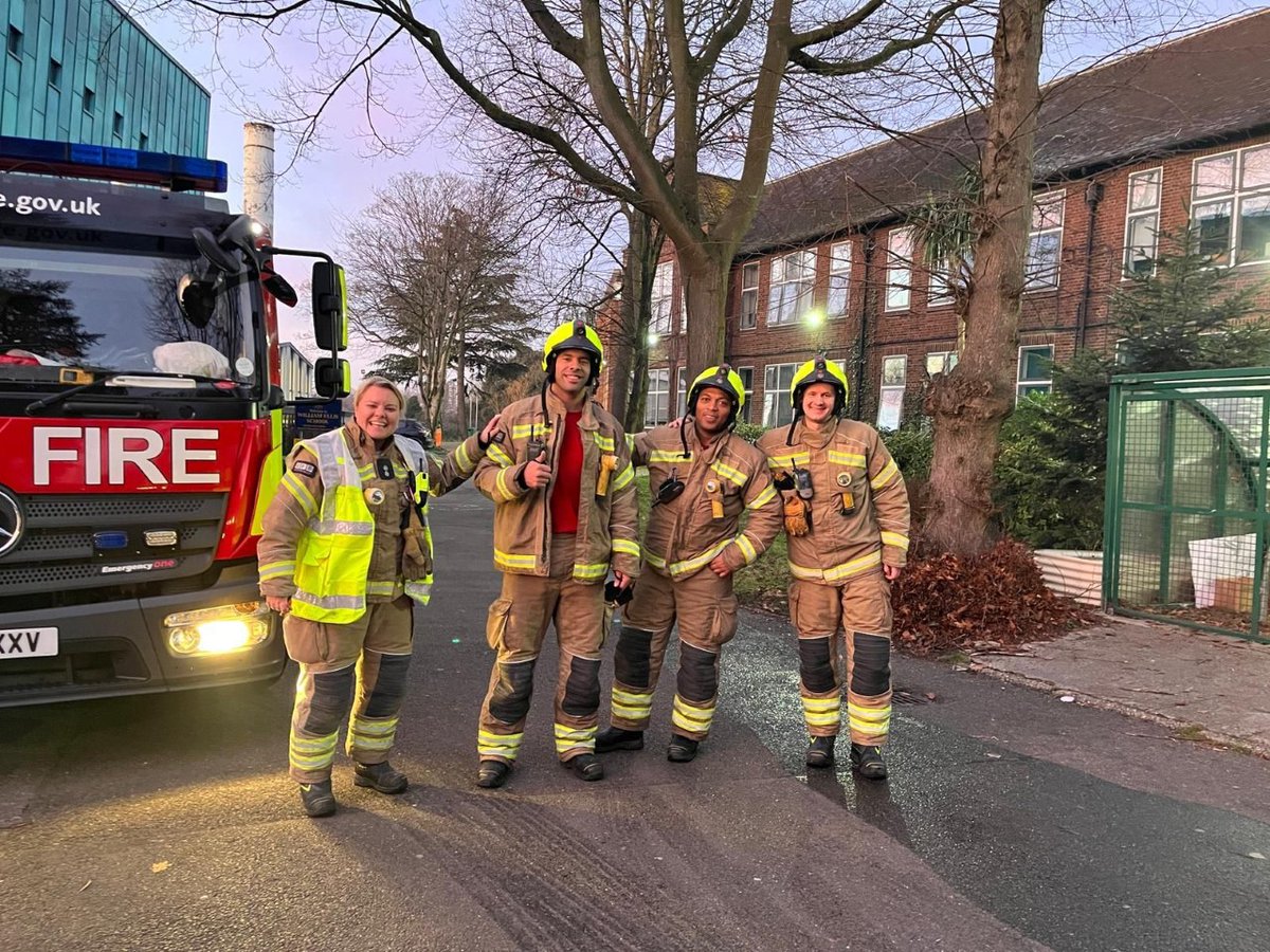 LondonFire's tweet photo. One of our firefighters had a call-out close to their heart today after a fire broke out in a school in #DartmouthPark. Steven (pictured second-left) is a former pupil and used his knowledge to quickly lead crews to the scene and put out the flames. https://t.co/N5ZqVR6IRz https://t.co/7yeajuKOke