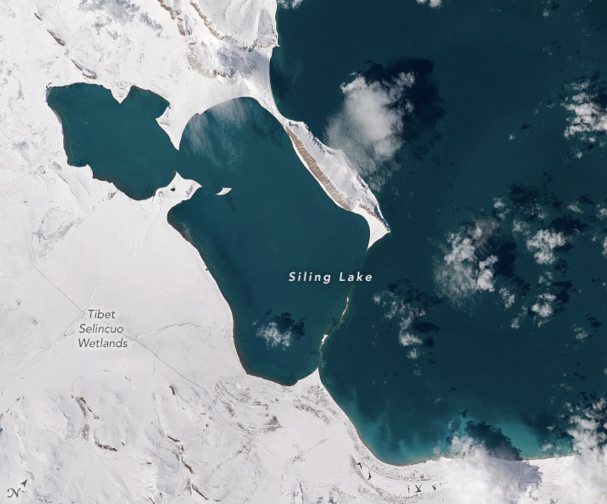 NASAEarth's tweet photo. Siling Lake – one of the largest water bodies on the Tibetan Plateau – hasn’t plateaued! The lake has been growing in recent decades.

An astronaut on the @Space_Station took this image of Siling Lake on Dec. 4, 2021, when the lake wasn’t frozen over. ��:https://t.co/f9qGKu7UHt https://t.co/tYpeMXVgpX