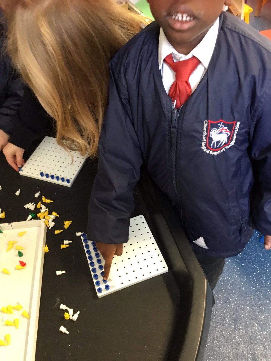Nursery have been creating #colourfulPatterns using small pegs. #EYFS  #FineMotorSkills