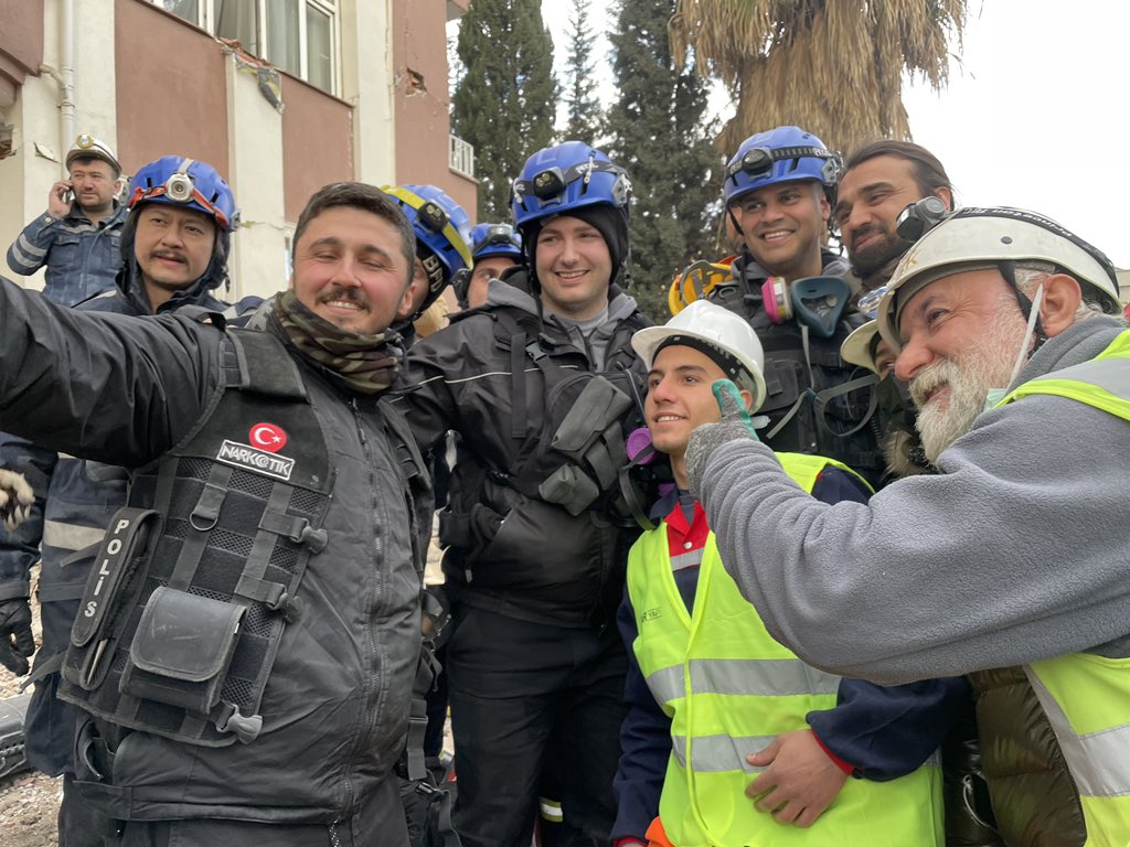 briarstewart's tweet photo. Scenes of jubilation after reachers drew a woman trapped in the rubble of a six story apartment building in #adiyaman Turkey. She was rescued with the help of Burnaby Urban Search and Rescue  @BurnabyFireDept @cbcnews https://t.co/IJD97bPNV6