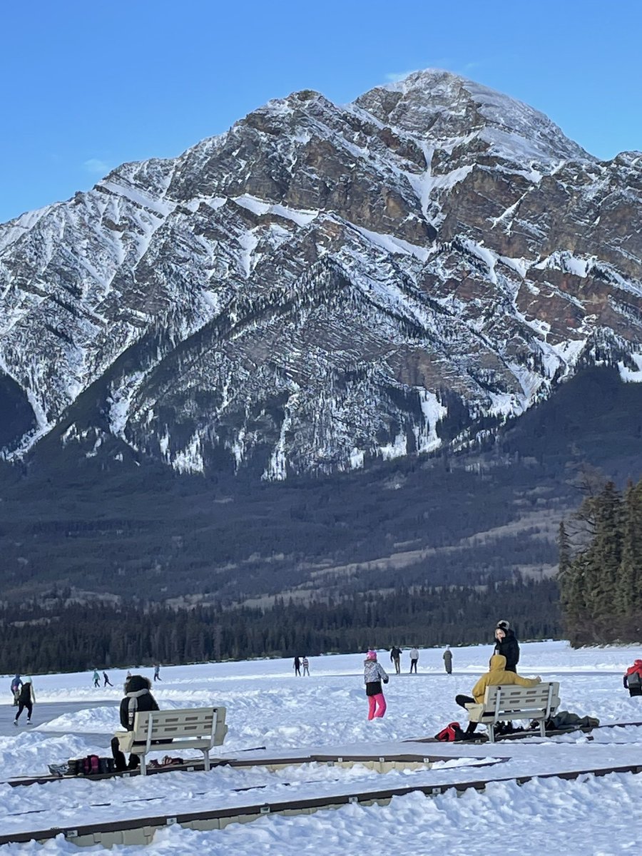 TFW you take kids on their first ever trip outside the city they were born in and the oldest is 10, and they find out 4 hours in a car gets you this! Skating on Lake Pyramid #JasperNationalPark #FosterDadTweets