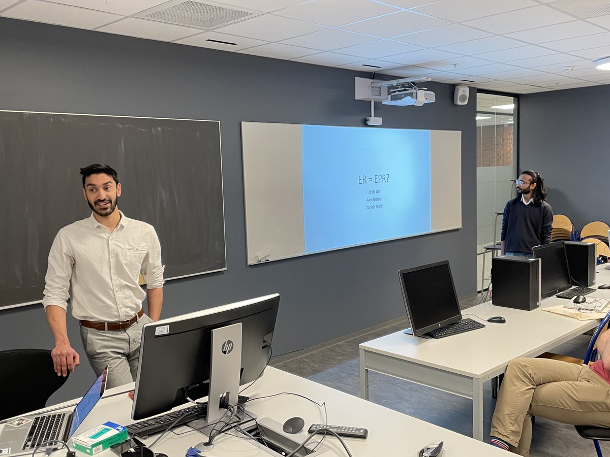 UiSIMF's tweet photo. Great initiative by our master students Shibl N. Gill & Zaryab Ahmed: they present an #NPACT seminar today on the ER=EPR conjecture, motivated by the 2022 @Nature paper on a realization of a #wormhole analog using a @Google #quantum processor. From #entanglement to #blackholes. https://t.co/8593ttVzO0