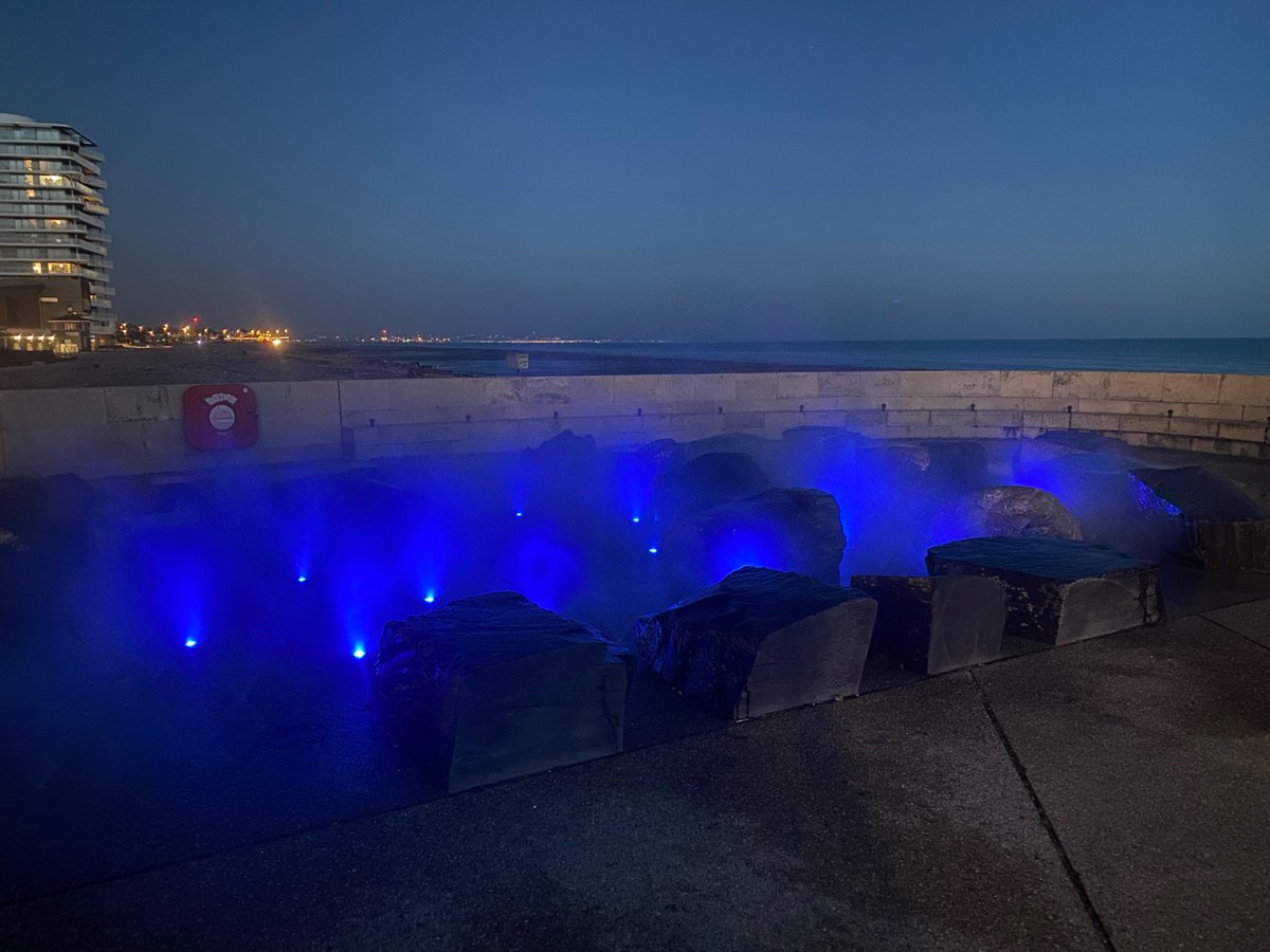 Ustigate's tweet photo. In 2010 Ustigate installed John Pegg's vision for Worthing seafront - a beautiful misting water feature, set amongst welsh slate boulders. In 2023 Ustigate returned to install a colour changing LED system #worthing #splashpoint Full case study here: https://t.co/gmTAYDLL50 https://t.co/E2SeqK7jB3