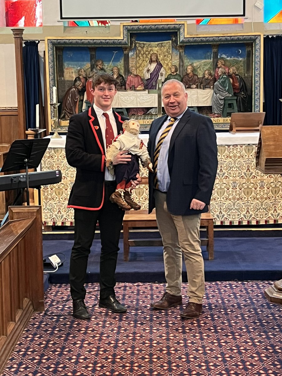 LlandoveryColPE's tweet photo. Here’s our captain James being presented with the monkey by the Warden before tomorrows big game against @ChristColBrecon 
#traditions 

Who’s coming tomorrow to support the team? 

@oldllandoverian @Oldboys_RFC https://t.co/qQAYd6MwW4