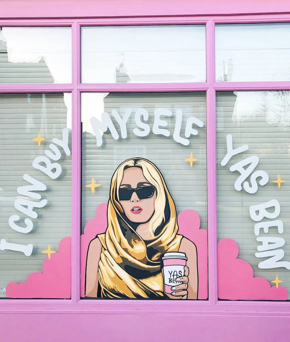 Miley Cyrus on the front of YAS BEAN coffee shop in England.