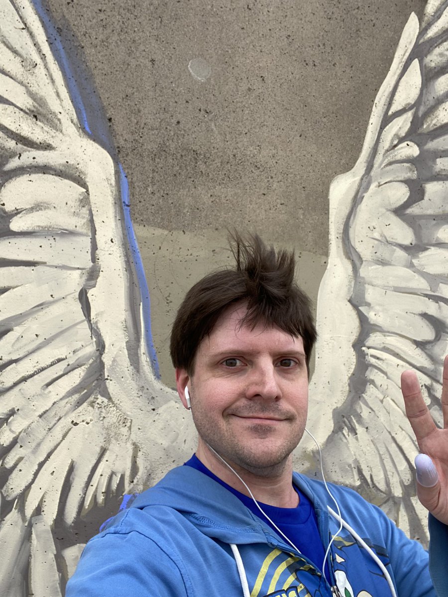 Post-5k practice, not in the best of shape, but good excuse to take a pic with these wings on @capegirardeau river wall