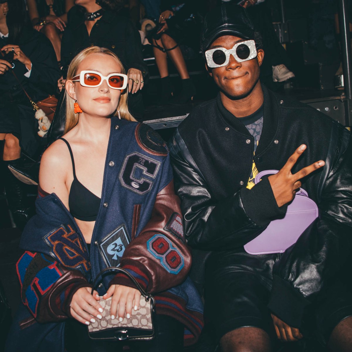Coach's tweet photo. Front row faces from #CoachSpring23: #BennyDrama, #CharliXCX, #AmeliaDimoldenberg, #WisdomKaye, #LilNasX, #DojaCat, #CoiLeray & #ConanGray. Who do you hope to see at #CoachFall23? 🤔 #NYFW #CoachNY https://t.co/TCFpYpJ5aV