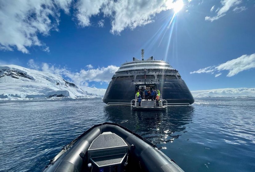 ScenicLuxury's tweet photo. A beautiful blue-sky day for the polar plunge in Antarctica. Captain Erwan le Rouzic spotted the crew and guests getting ready for this once-in-a-lifetime experience.

Would you be the one doing the polar plunge or watching it from the Zodiac? https://t.co/wApEY29LYF