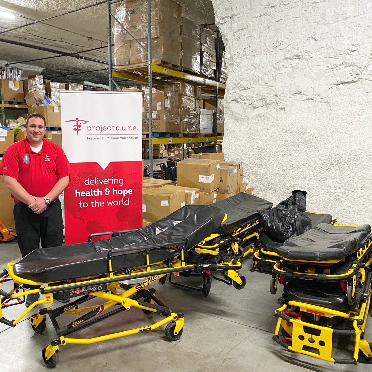 projectcure's tweet photo. Ryan Morrison drove all the way from Saint Louis to our Project C.U.R.E. Kansas City warehouse to donate these 8 #Stryker #gurneys from #MedicOne! Thanks Ryan! Many lives will have access to better health because of @MedicOne_EMS and your commitment to making a difference! ππΎ https://t.co/ep3cTxmZ8A